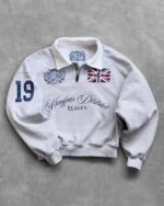 Polo Mayfair con mezza zip di Reaven Gray