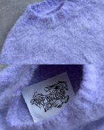 Acquista subito il maglione in mohair Reaven Lilac Breeze Nuvola nel nostro negozio. Acquista subito maglieria di lusso!