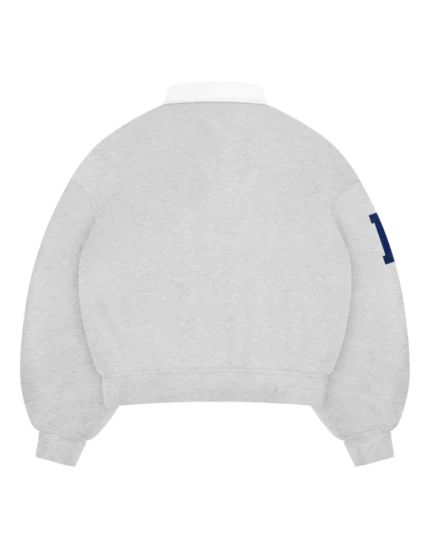 Polo Mayfair con mezza zip di Reaven Gray